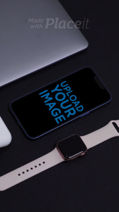 Video of an iPhone 13 Placed over a Dark Desk and Surrounded by Digital Devices