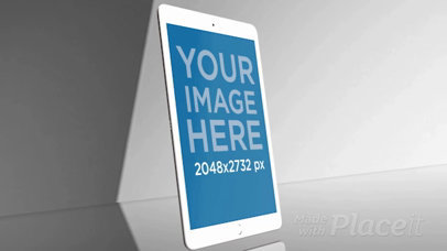 Video of an Angled White iPad Standing in a Gray Room