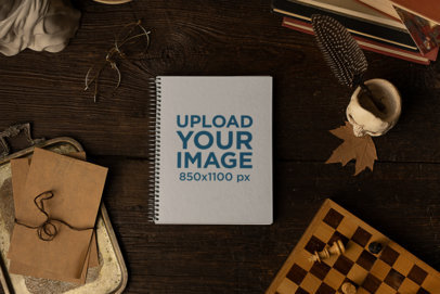 Dark Academia-Themed Notebook Mockup Featuring a Wooden Table
