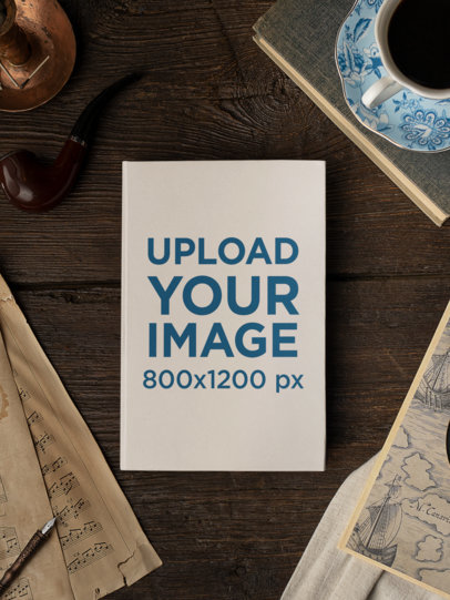 Mockup of a Hard Cover Book Surrounded by Vintage Objects