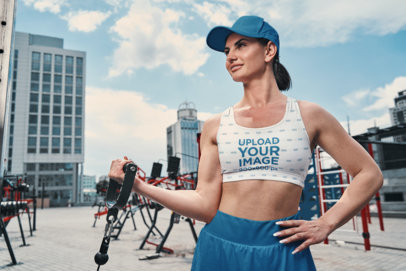 Sports Bra Mockup Featuring a Smiling Sporty Woman Exercising