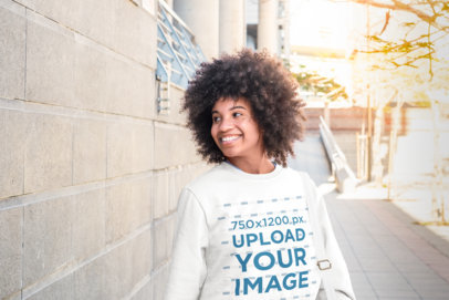 Crewneck Sweatshirt Mockup Featuring a Smiling Woman Walking on the Street m12622 r-el2