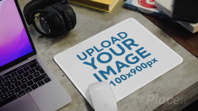 Video Featuring a Mousepad Lying Next to a Laptop