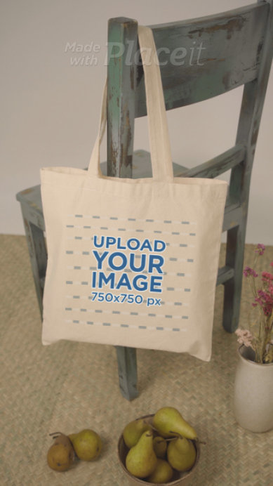 Video of a Tote Bag Hanging From an Old Rustic Chair
