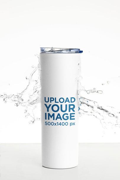 Skinny Tumbler Mockup Featuring a White Background and Splashing Water m24311