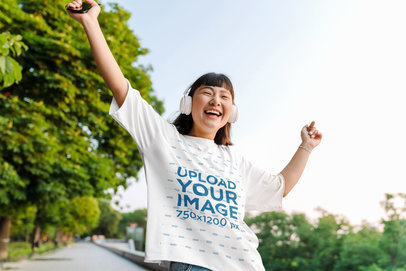 Unisex Tee Mockup of a Happy Woman Enjoying Her Music