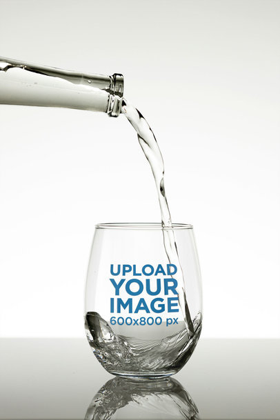 Mockup of a Glass with Water Being Poured Into