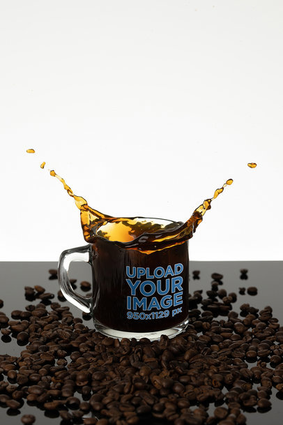 Mockup of an 11 oz Clear Mug Surrounded by Coffee Beans