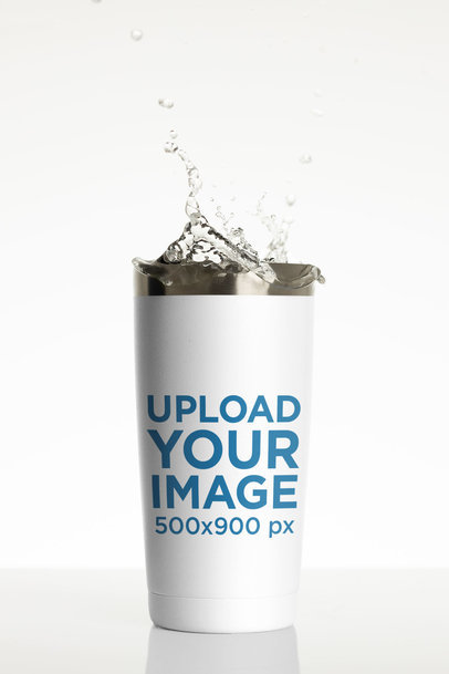 Mockup of a Travel Mug Featuring Water Splashing m24318