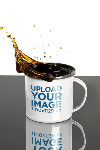 Mockup of a 12 oz Enamel Mug Featuring Splashing Coffee 