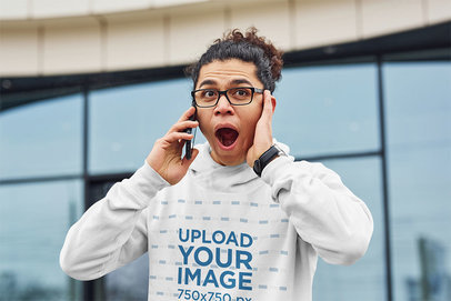 Pullover Hoodie Mockup of a Man with Glasses Making a Surprise Facial Expression