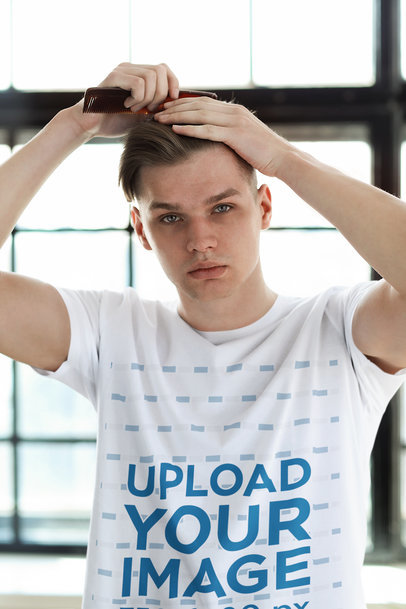 T-Shirt Mockup of a Young Man Combing His Hair M24700-r-el2