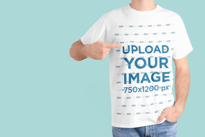 Mockup of a Man Pointing at His Round-Neck T-Shirt at a Studio