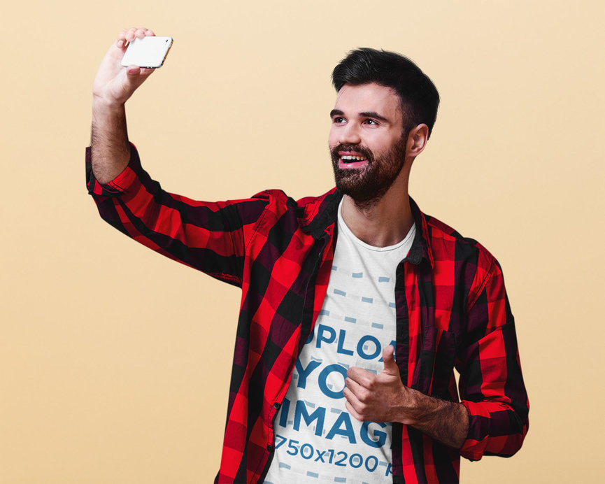 Round-Neck Tee Mockup of a Bearded Man Taking a Selfie 