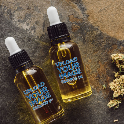Mockup Featuring Two Dropper Bottles of CBD Oil