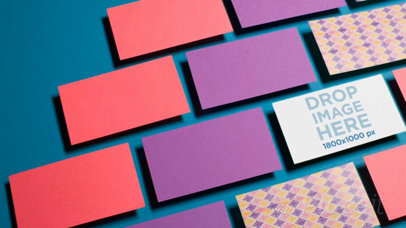 Business Card Video Lying on a Solid Surface with other Business Cards around It