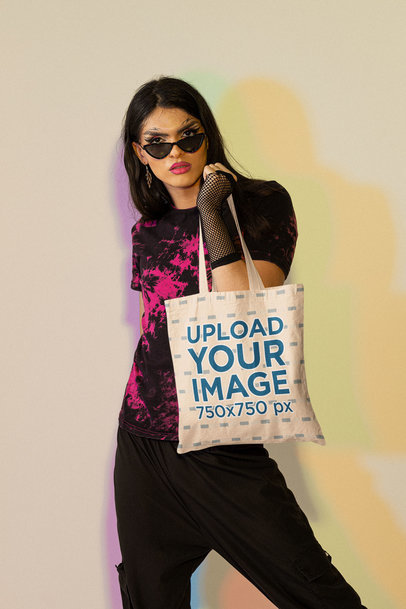 Mockup of a Tote Bag Featuring a Woman with Graphic Eye Makeup m24049