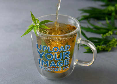 Mockup of a Transparent Mug Filled With Weed Tea m23389-r-el2