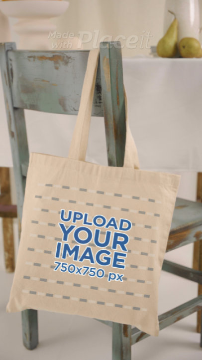 Video of a Tote Bag Hanging From a Vintage Rustic Chair