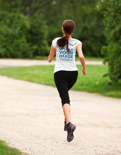Back View T-Shirt Mockup Featuring a Brunette Woman Running