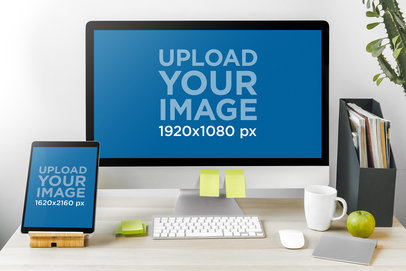 Mockup of an iMac and iPad Placed on an Office Desk