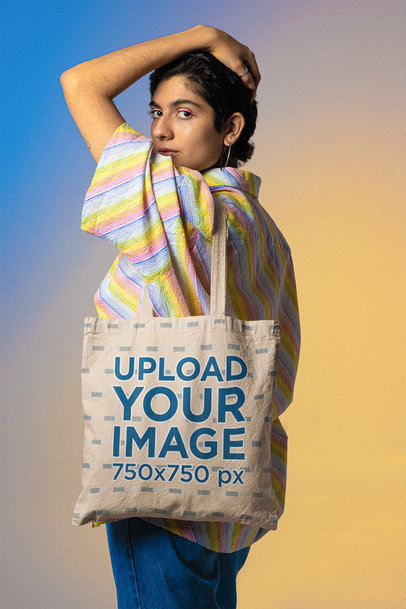 Mockup of a Tote Bag Featuring a Woman with a Rainbow Shirt