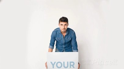 Young Man Holding a Big Poster Video Mockup Putting It Up