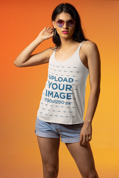 Tank Top Mockup of a Woman Posing with Graphic Makeup and Sunglasses Against a Colorful Background m23981