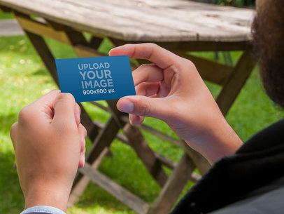 Print Design Mockup, Man Holding Business Card Outside
