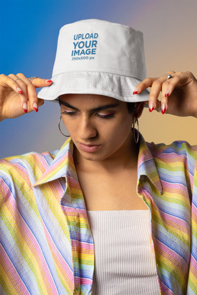 Mockup of a Serious Woman Wearing a Bucket Hat and Colorful Garments