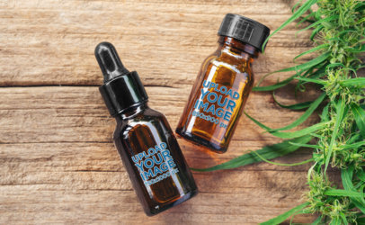 Mockup of a Dropper and an Amber Bottle Featuring a Hemp Plant