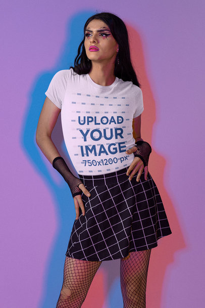 T-Shirt Mockup of a Woman with Graphic Makeup Posing Against a Multicolor Set m24047