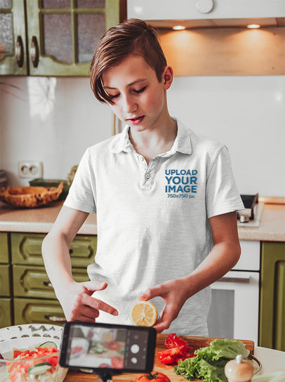 Polo Shirt Mockup Featuring a Boy Video Blogging for a Cooking Channel m24189-r-el2