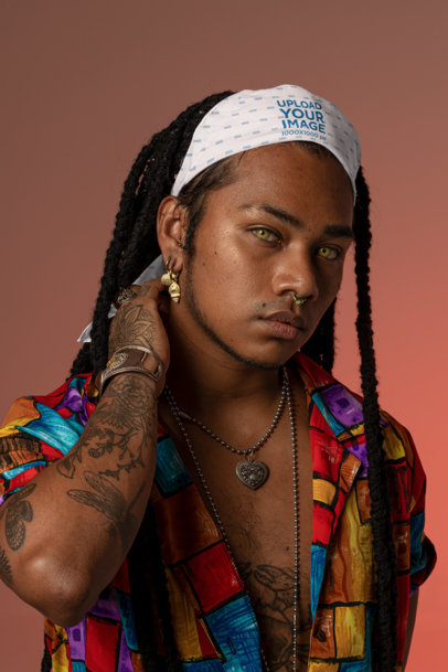 Bandana Mockup Featuring a Closeup of a Tattooed Person Posing with a Serious Look