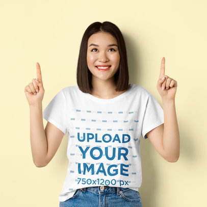 T-Shirt Mockup of a Woman Looking Up in a Studio