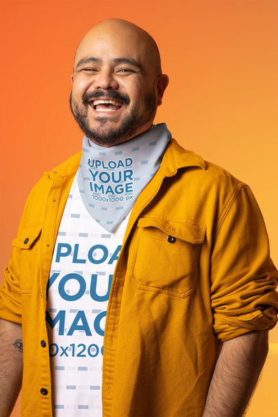 Mockup of a Bandana and a T-Shirt Featuring a Happy Man Posing Against a Colored Background