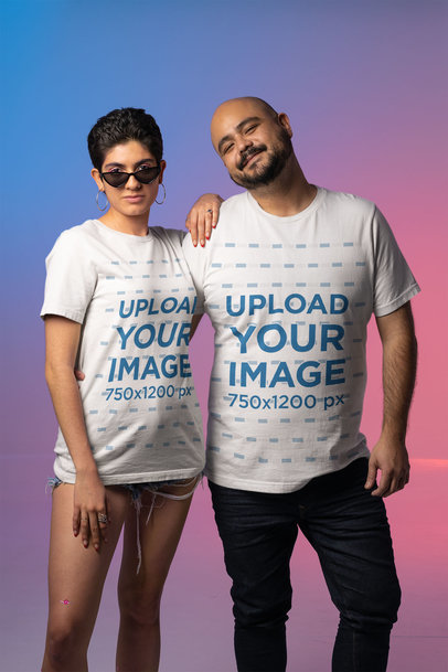 Bella Canvas T-Shirt Mockup Featuring a Woman and a Man at a Studio