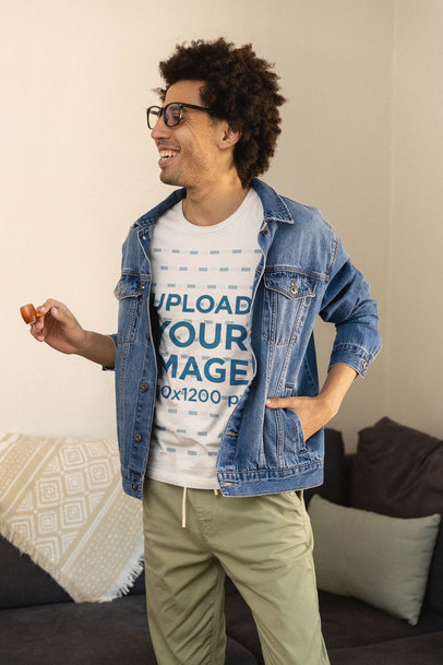 420-Themed T-Shirt Mockup of a Man Holding a Smoking Pipe m25453