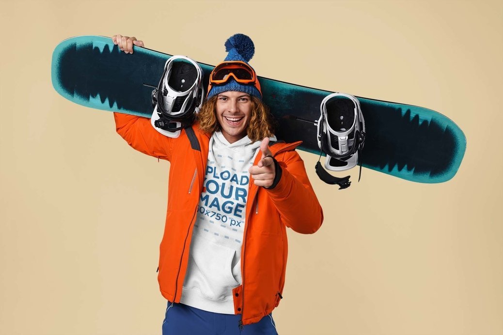 Hoodie Mockup of a Happy Man Carrying a Snowboard