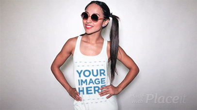 Trendy Girl with Pigtails and Sunglasses Wearing a Tank Top Video Smiling a13183