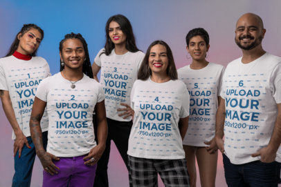 Bella Canvas Tee Mockup Featuring a Group of Friends Posing at a Studio