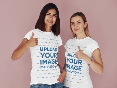 T-Shirt Mockup of Two Women Giving Their Thumbs-Up