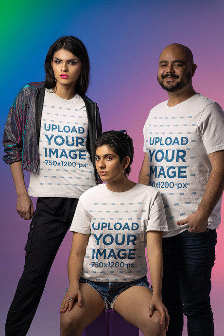 Bella Canvas T-Shirt Mockup Featuring Two Females and a Male Posing Against a Colorful Background