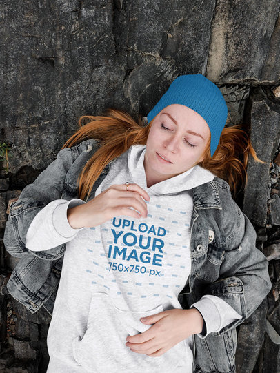Heathered Hoodie Mockup Featuring a Woman Lying on a Rock m6750-r-el2