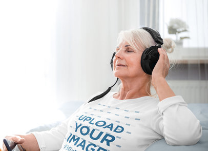 Long-Sleeve Tee Mockup of a Senior Woman Enjoying a Song
