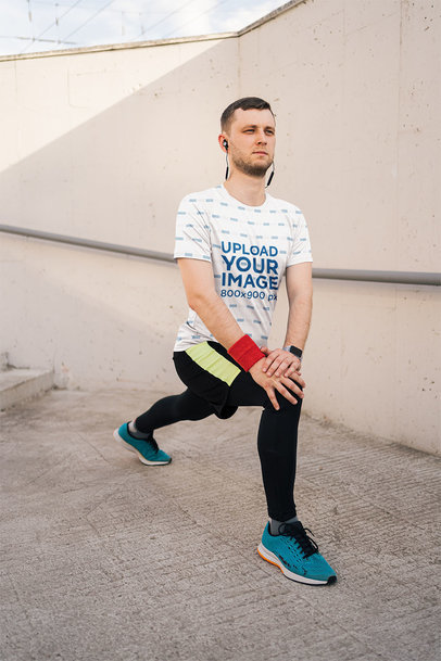 Activewear Mockup Featuring a Man Warming Up in a T-Shirt