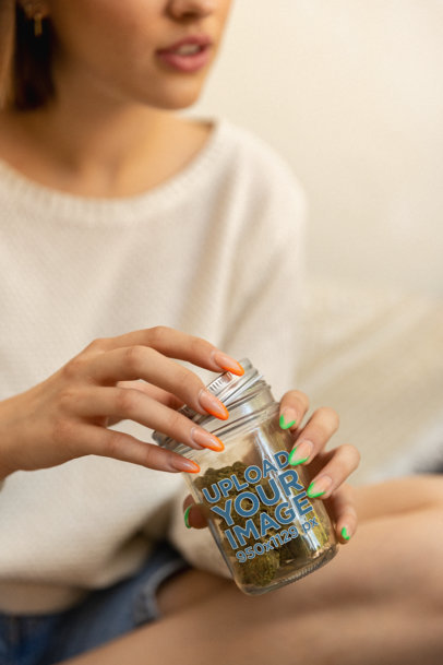 Cannabis-Themed Mockup of a Mason Jar Being Hold by a Woman