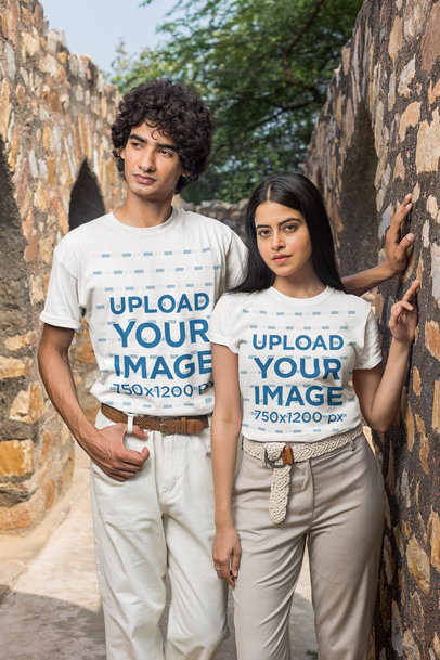 T-Shirt Mockup of a Couple Posing in Some Old Ruins