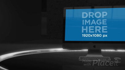 Video of an iMac Standing in a Dark Room a16236b