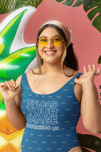 Sublimated Swimsuit Mockup Featuring a Happy Woman Posing at Summer-Themed Set